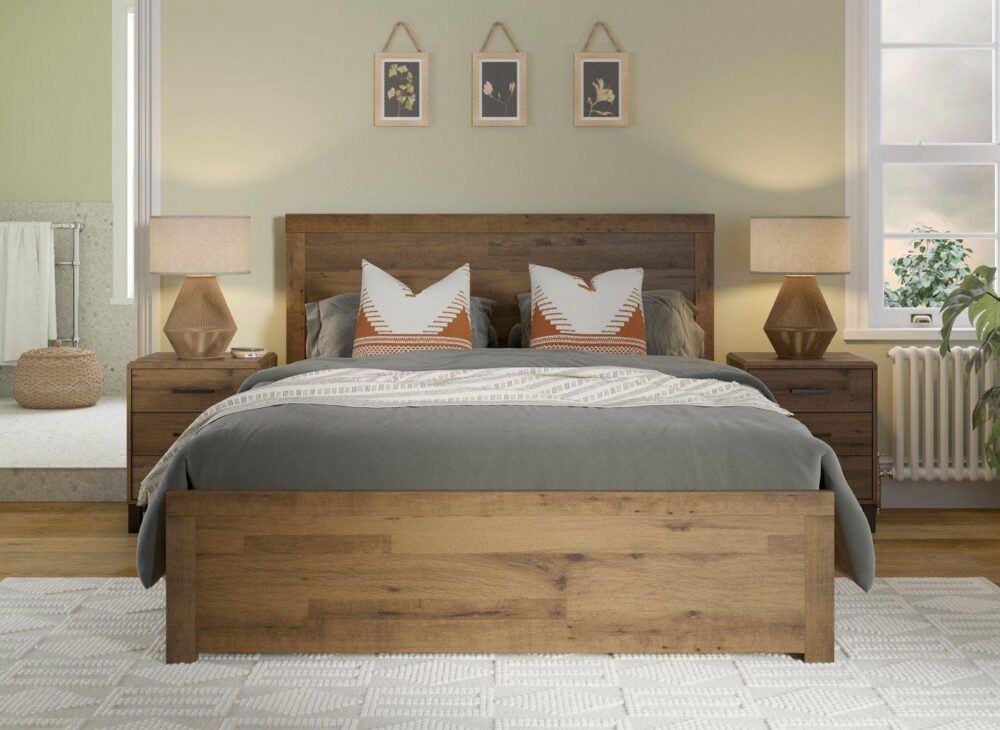 Dark brown wooden bed frame pictured in a green room