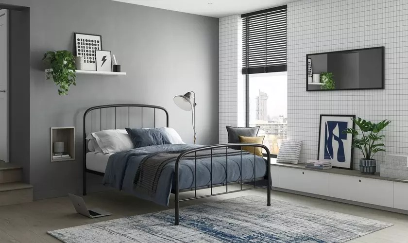 Metal bed frame in industrial style bedroom